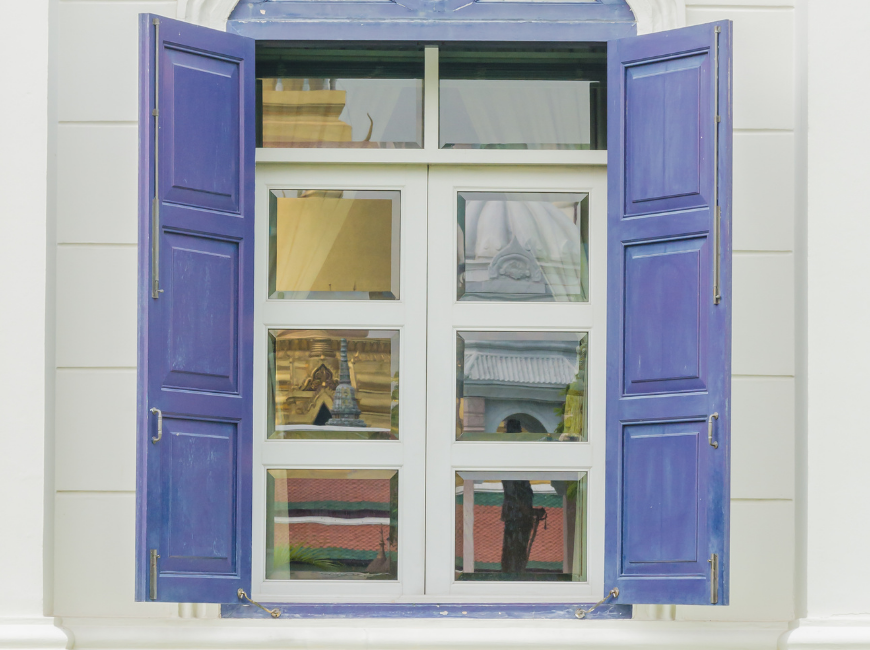 blue/purple shutters that need to be repaint