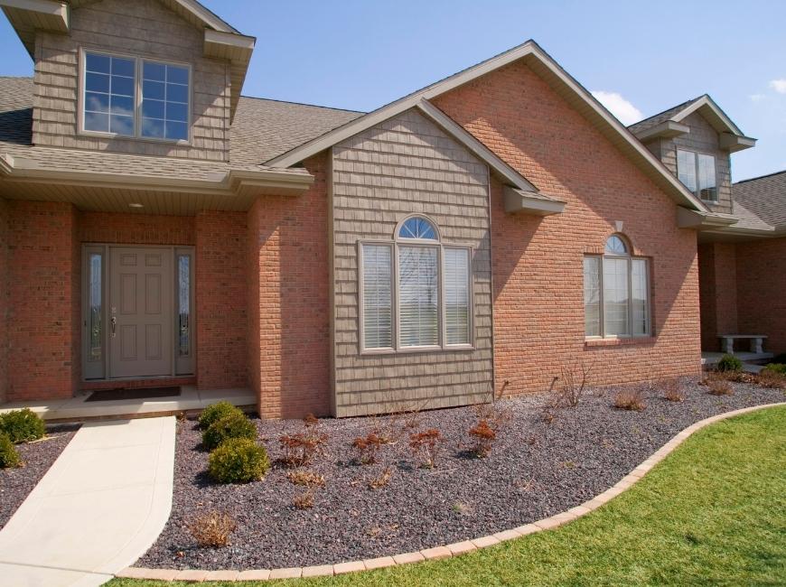 brick home exterior windows no shutters