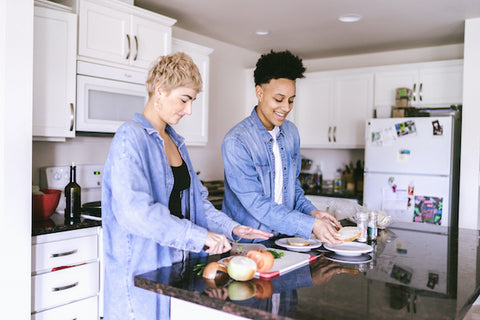 A couple practices mindful eating while cooking dinner