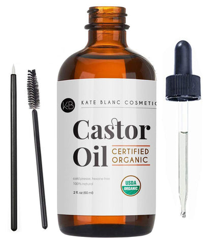 bottle of castor oil with dropper and mascara wand