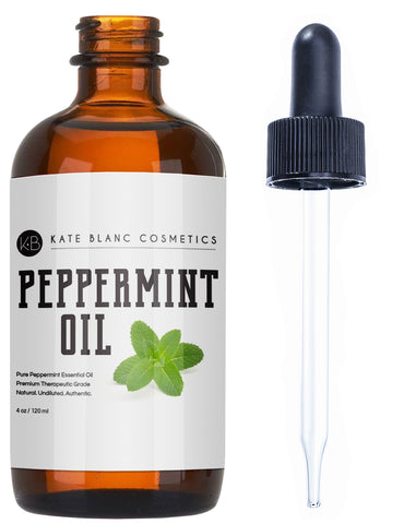amber bottle of peppermint oil with dropper