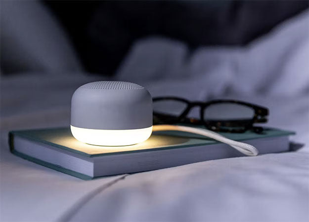 night light with book and glasses