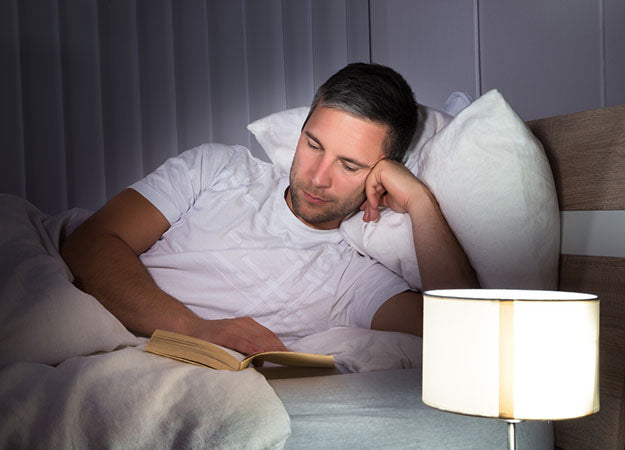 reading book in bed