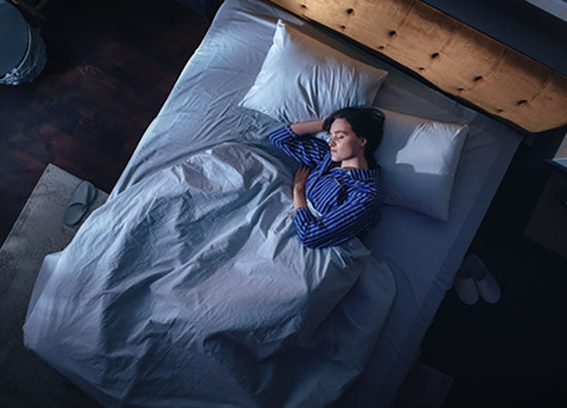 top view of woman sleeping