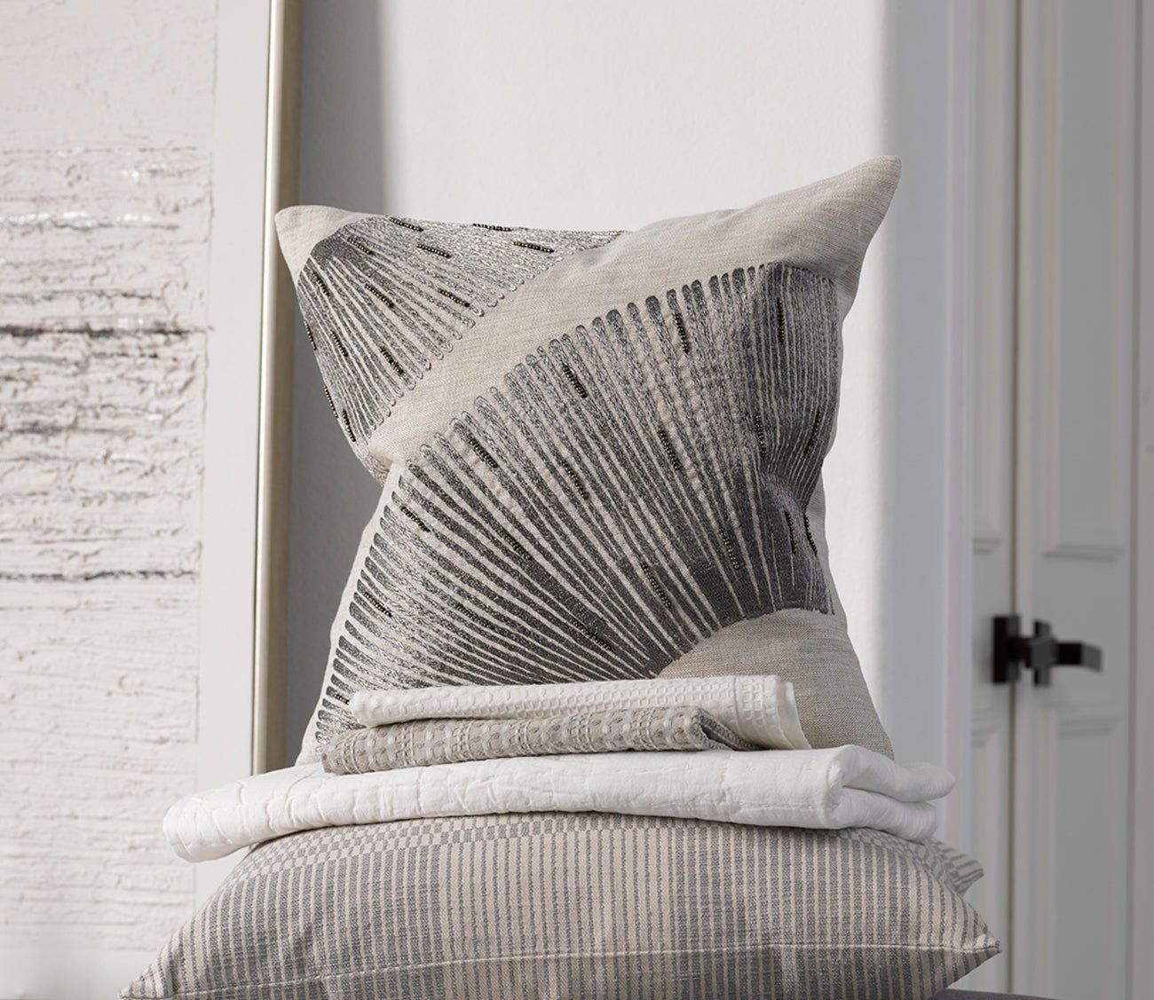 https://cdn.shopify.com/s/files/1/2420/9425/products/leda-charcoal-throw-pillow-by-villa-by-classic-home-185832.jpg?v=1683055508