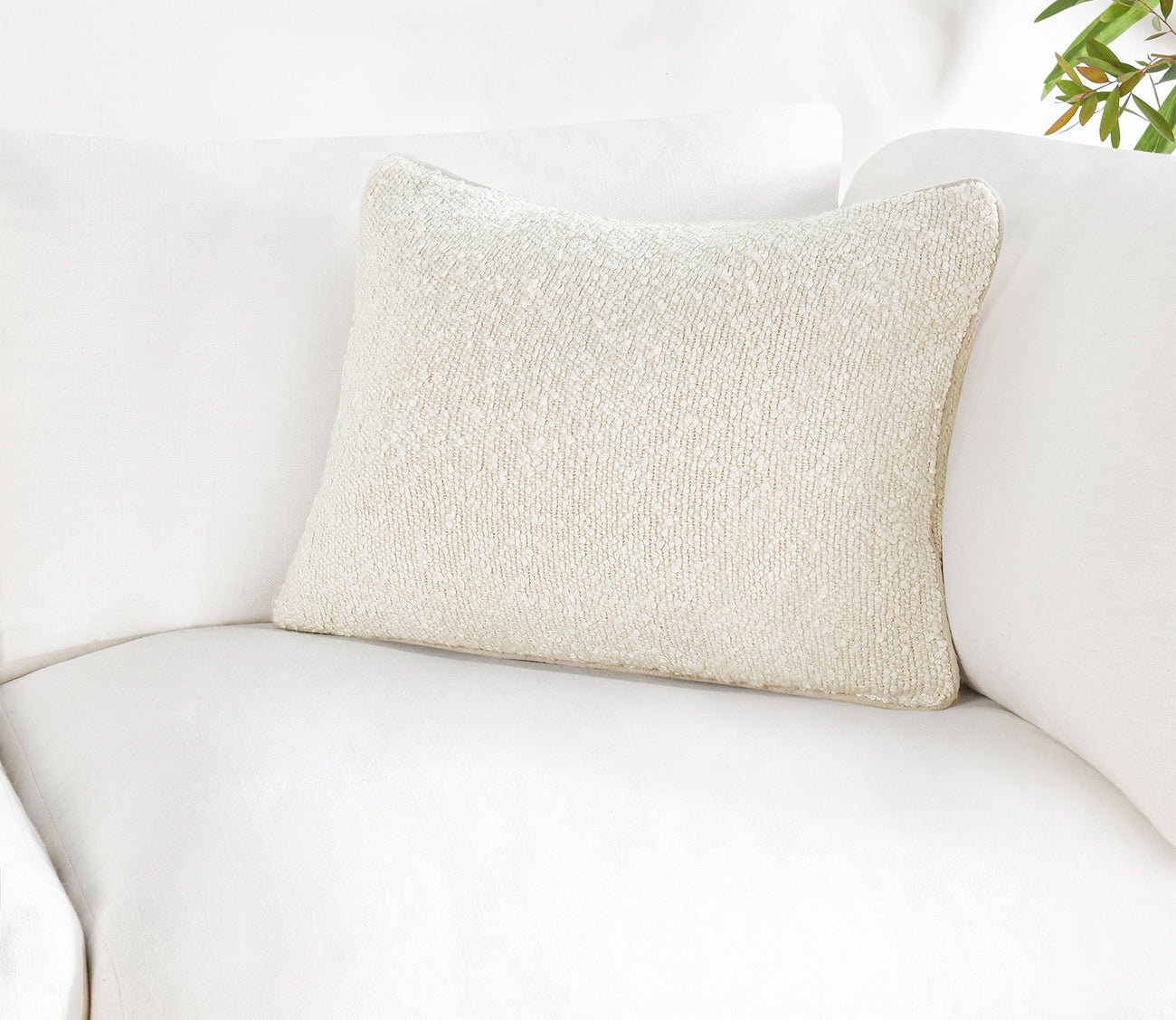 https://cdn.shopify.com/s/files/1/2420/9425/products/sava-ivory-throw-pillow-by-villa-by-classic-home-197106.jpg?v=1699691285