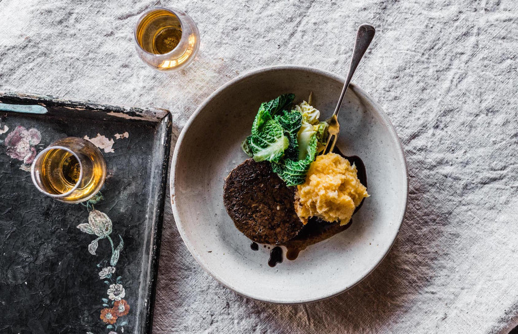 Haggis served with Neeps and Tatties and a dram of Whisky