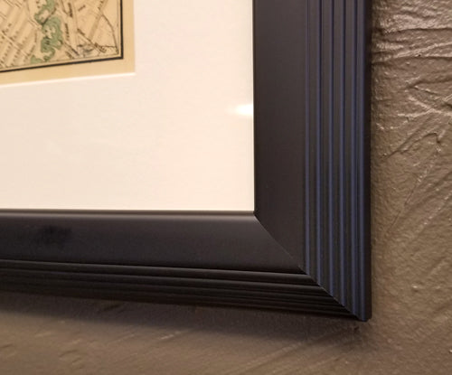 Custom/Archival Black Stepped Frame Corner with Matting: Smooth Black Finish on Tiered or "Stepped" Profile