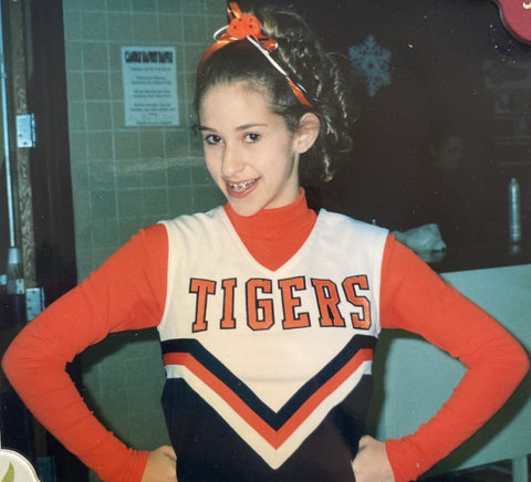 Echelon Member Melissa S. as a high school cheerleader 