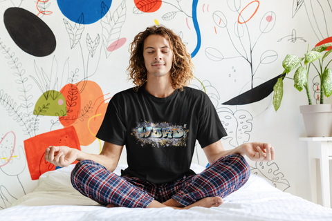 man-in-pajamas-in-word-tshirt-in-yoga-pose