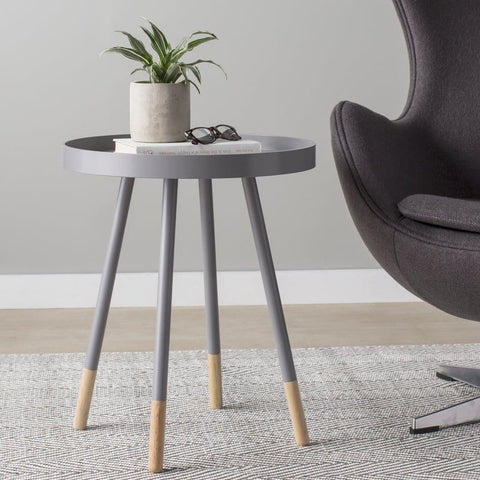 Circular gray nightstand with raised rim 