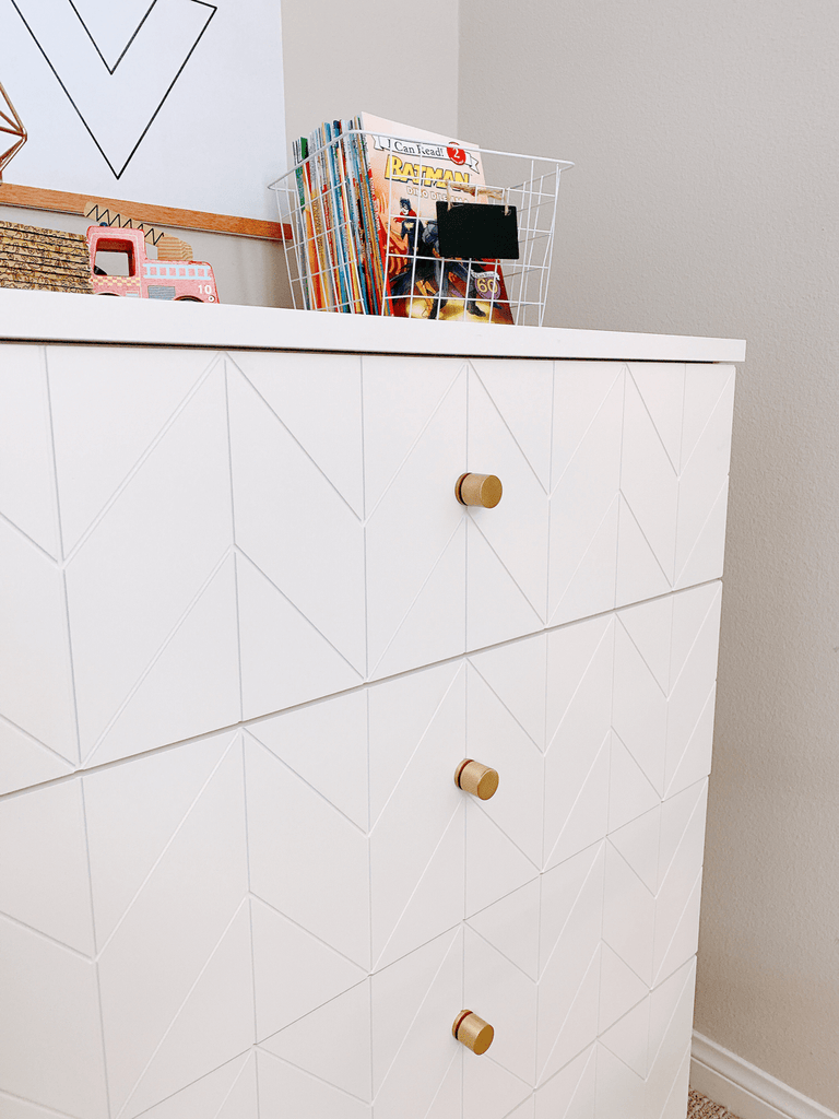 Norse Interior's brass Elisabeth knobs with Eleanor drawer fronts on a Malm dresser from IKEA.