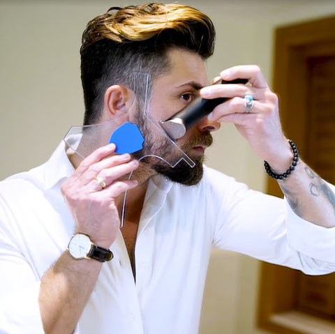 <img src="Clearshaper Trim.png" alt="man with Aberlite Clearshaper using trimmer to trim cheek line">