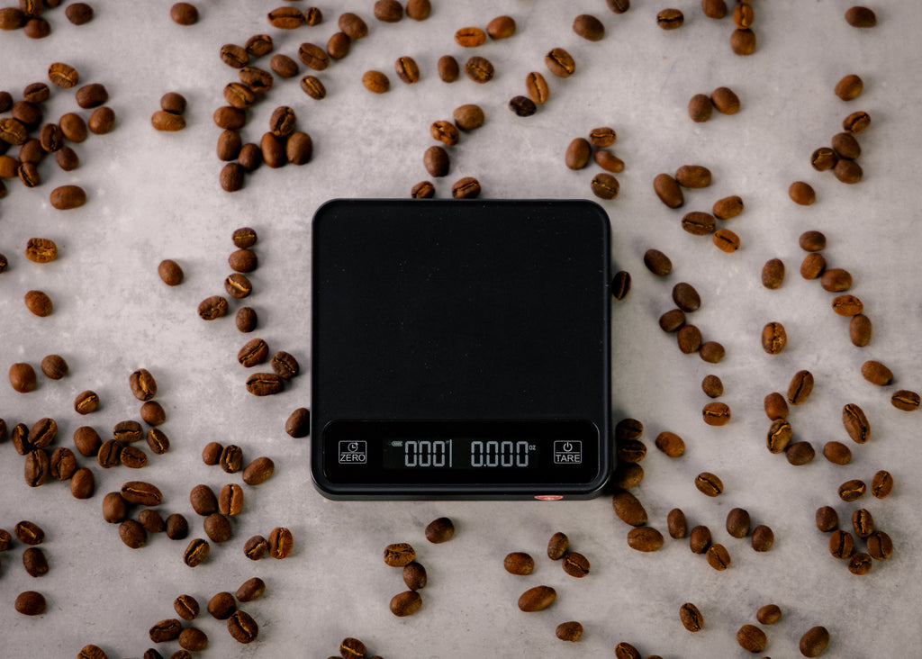 Eureka Precision Scale with coffee beans