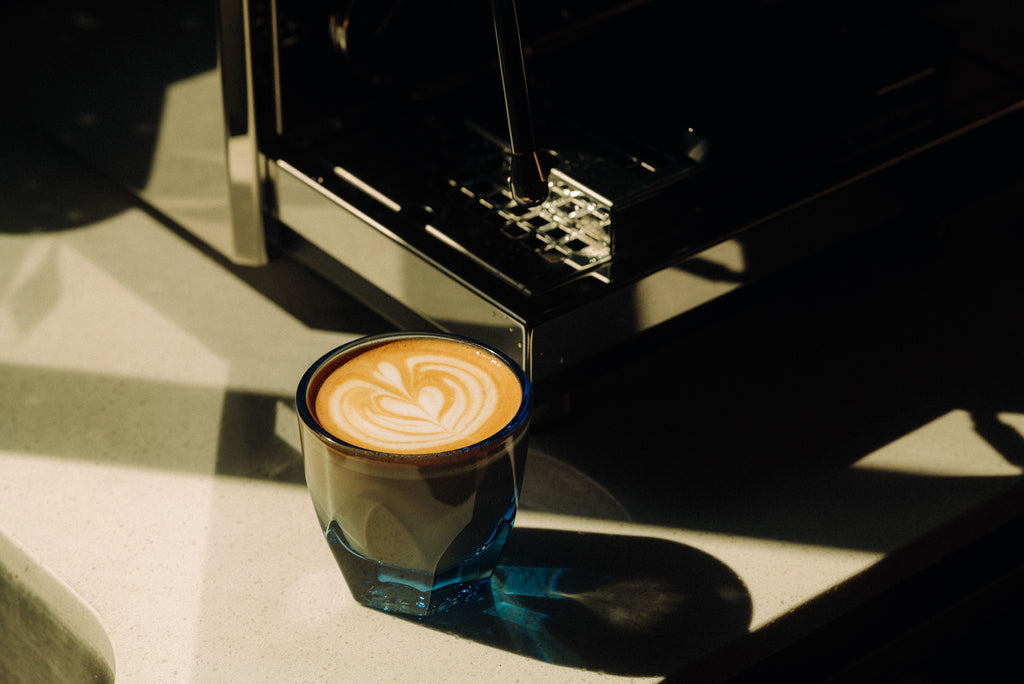 latte art lifestyle photo by clive coffee
