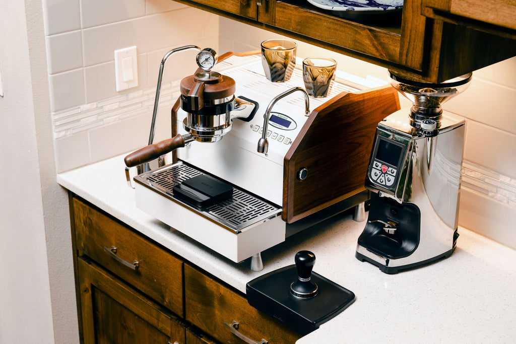 Eureka Atom 75 espresso grinder in chrome lifestyle photo by Clive Coffee