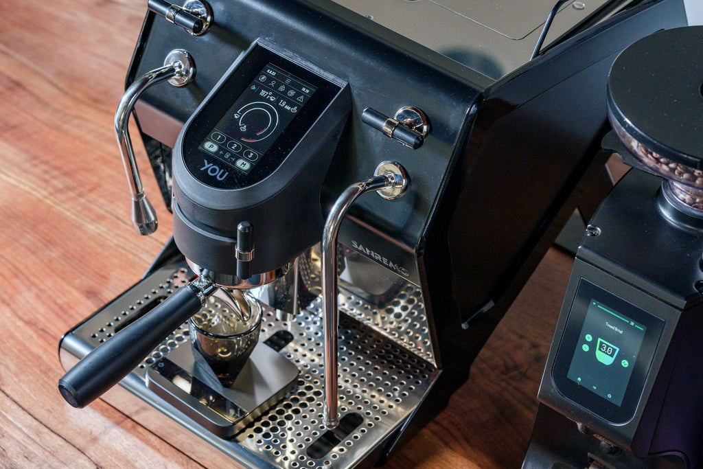 Sanremo You espresso machine touchscreen with the LUCCA Atom 75 espresso grinder
