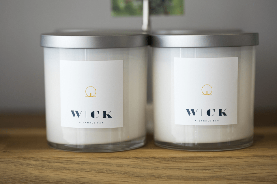 Two cannabis candles from Wick Candle Bar