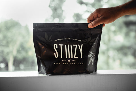 A cannabis brand like STIIIZY offers gift bags filled with cannabis products.