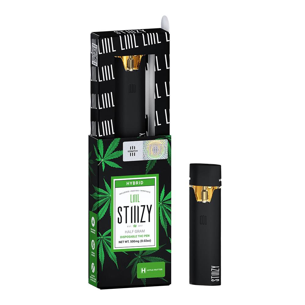A disposable weed pen with distillate derived from the Apple Fritter strain stands outside its black box.