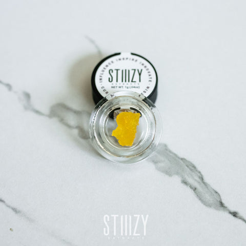 A wet clumpy live resin extract in Stiiizy’s clear case.