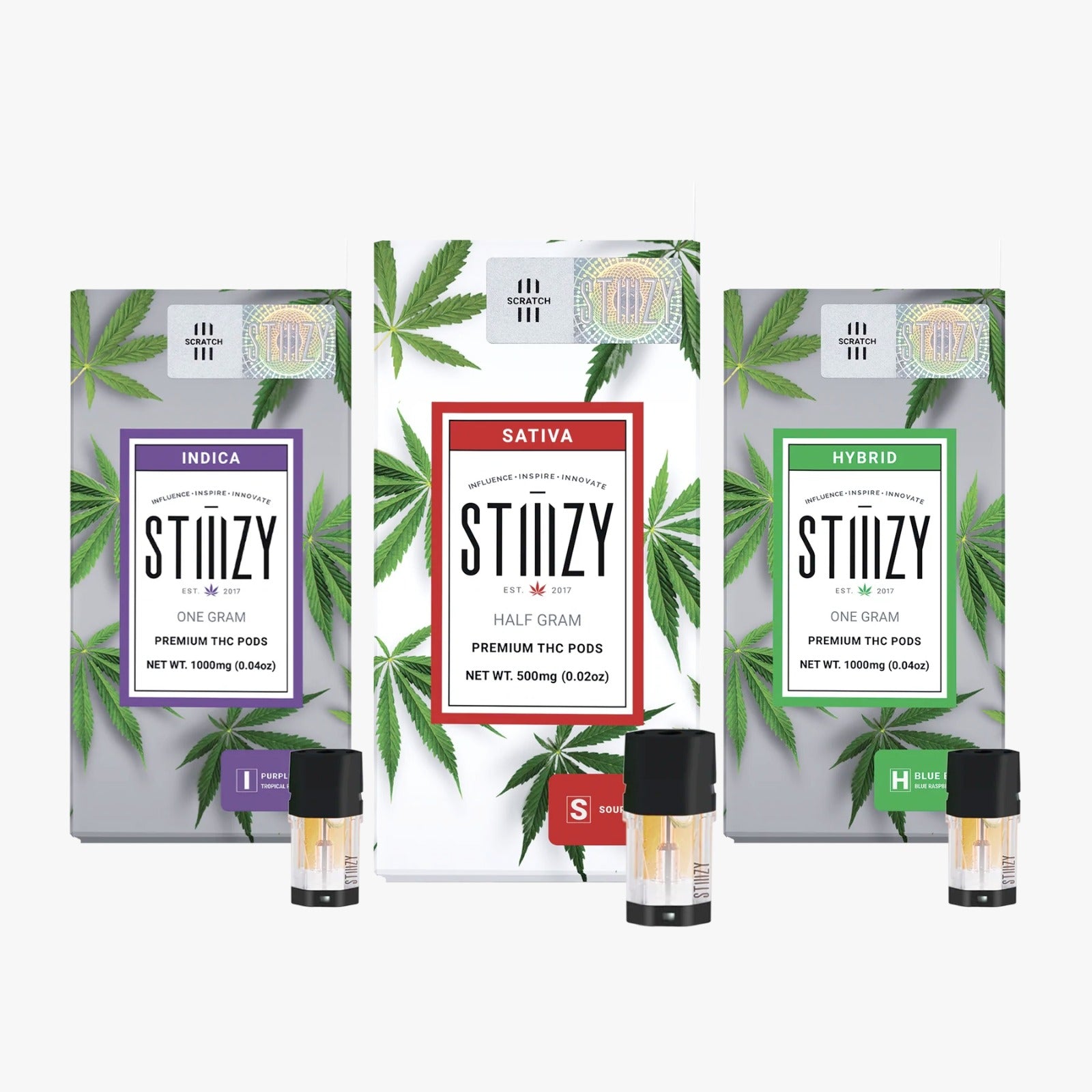 Three original THC weed vape pods with botanical terpenes stand in front of their STIIIZY packages.