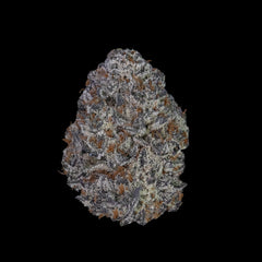 A berry-shaped nug of cannabis flower from the purple punch strain stands against a black background.