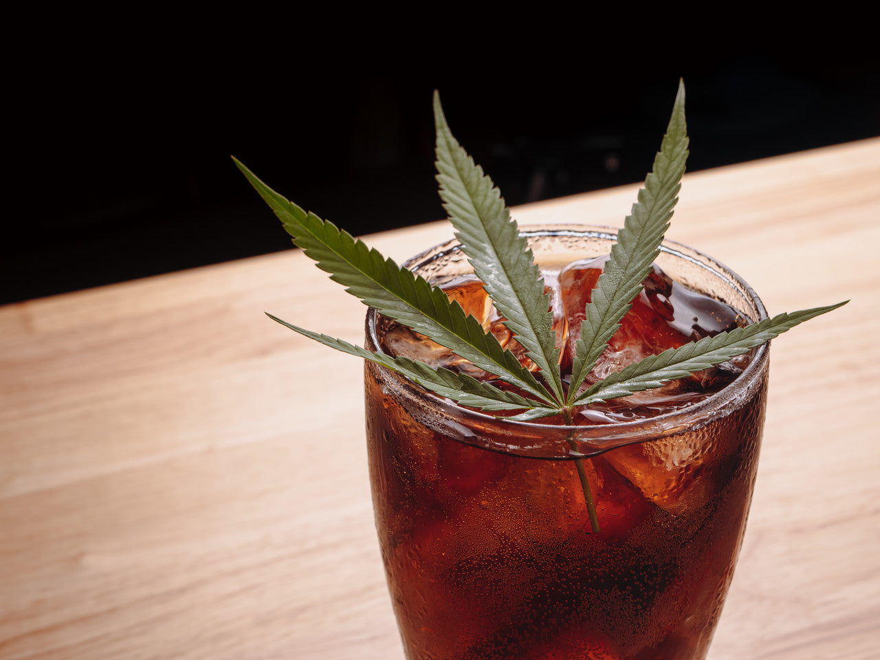 A cup of cannabis-infused cola and ice is weed edible you can drink.