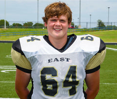 Zachary number 64 in football uniform