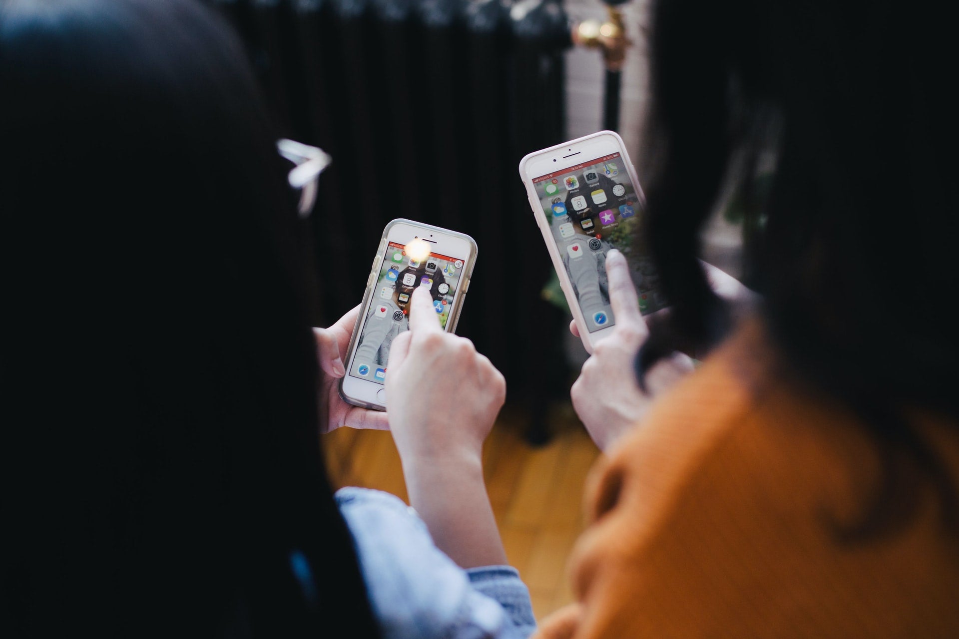 Two people on cell phone