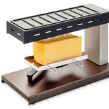 Raclette melter with grill top and cheese under heater
