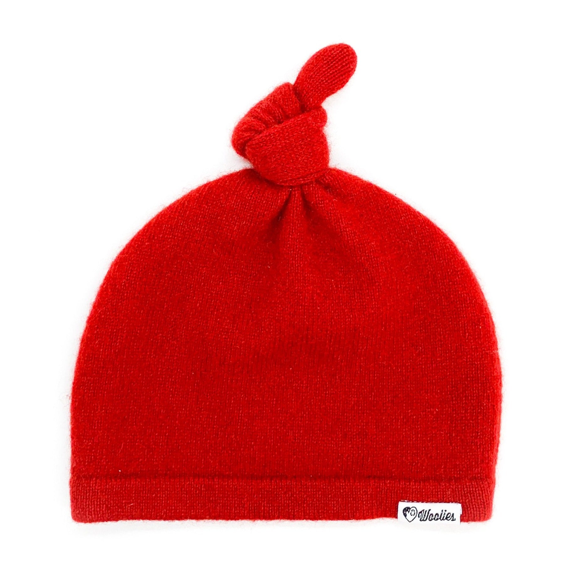 baby in red beanie