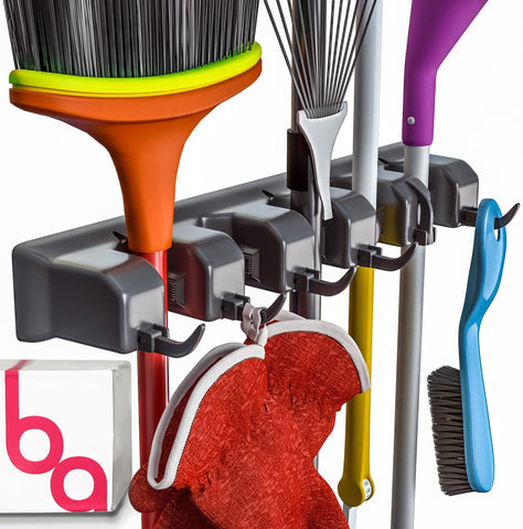 Broom and tool holder/organizer