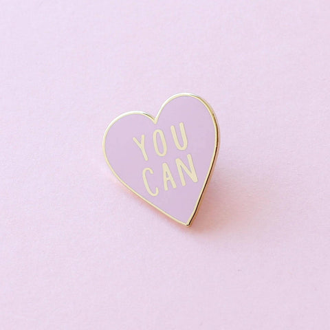 Pink heart pin saying "you can"