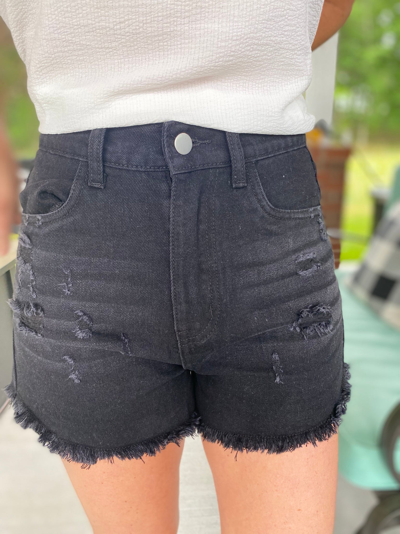 distressed black jean shorts