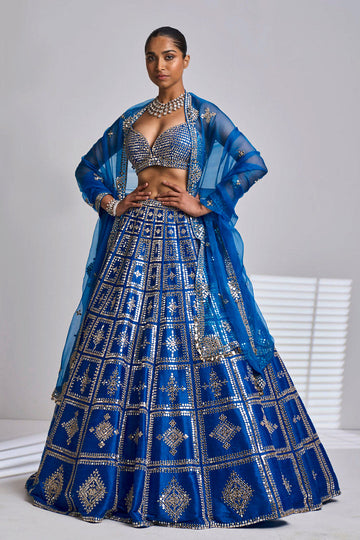 11 New Lehenga Silhouettes For Brides To Rock On Their Mehendi! | Blue  bridal, Sangeet outfit, Winter bride