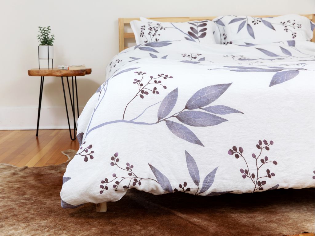 Organic European flax linen duvet cover with modern Scandinavian design featuring purple leaves