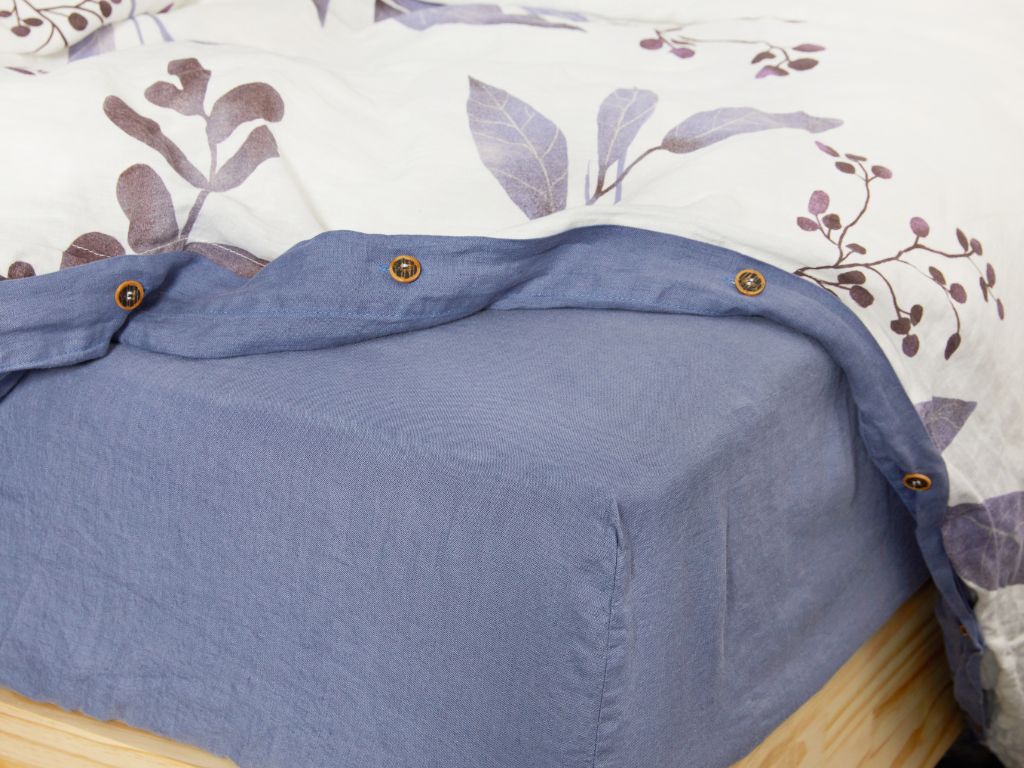 Organic European flax linen duvet cover with purple leaves and matching fitted sheet by The Modern Dane