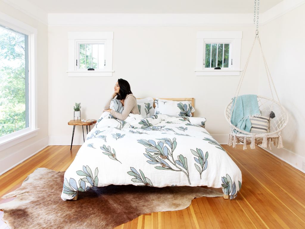 Bedroom with organic European flax linen duvet cover with botanical design inspired by Scandinavian nature