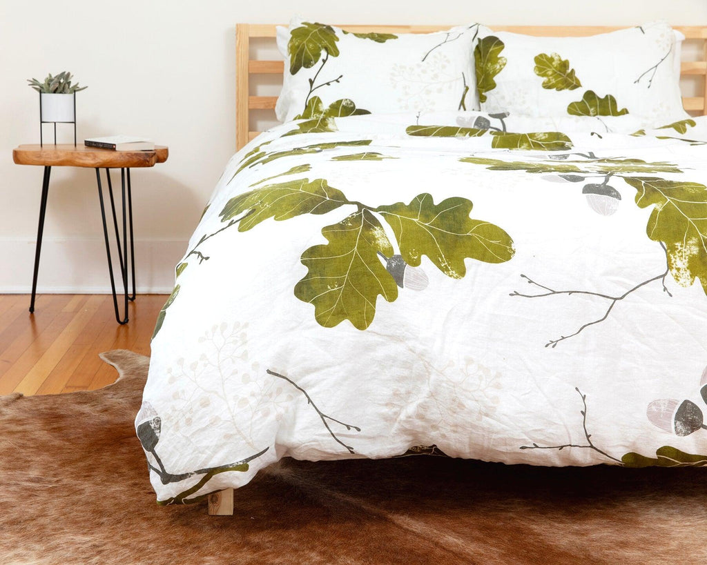 Organic European linen duvet cover in modern Scandinavian design with oak leaves print