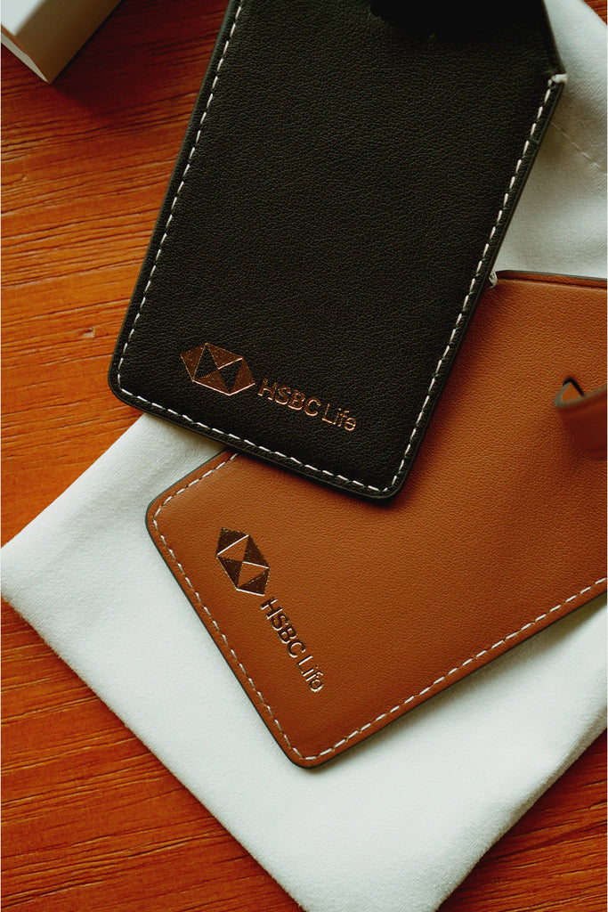 Rever personalised leather luggage tags, custom made as personalised corporate gifts for HSBC Bank