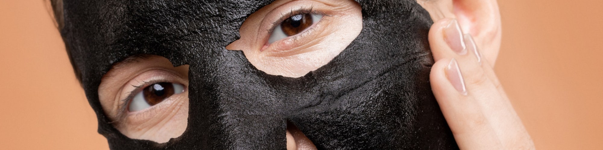 Woman with black facemask on