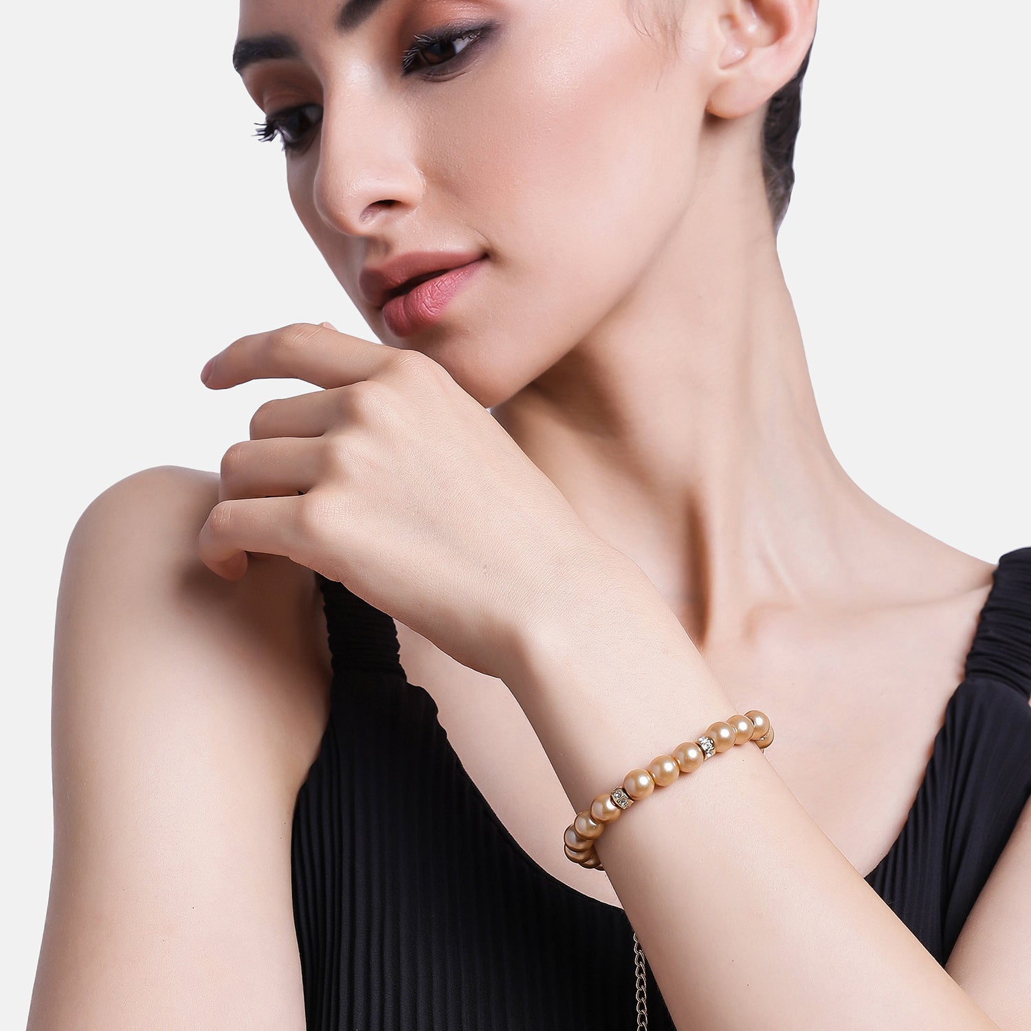 

Estele - Fancy Gold Pearl Single line Bracelet with Crystal Balls