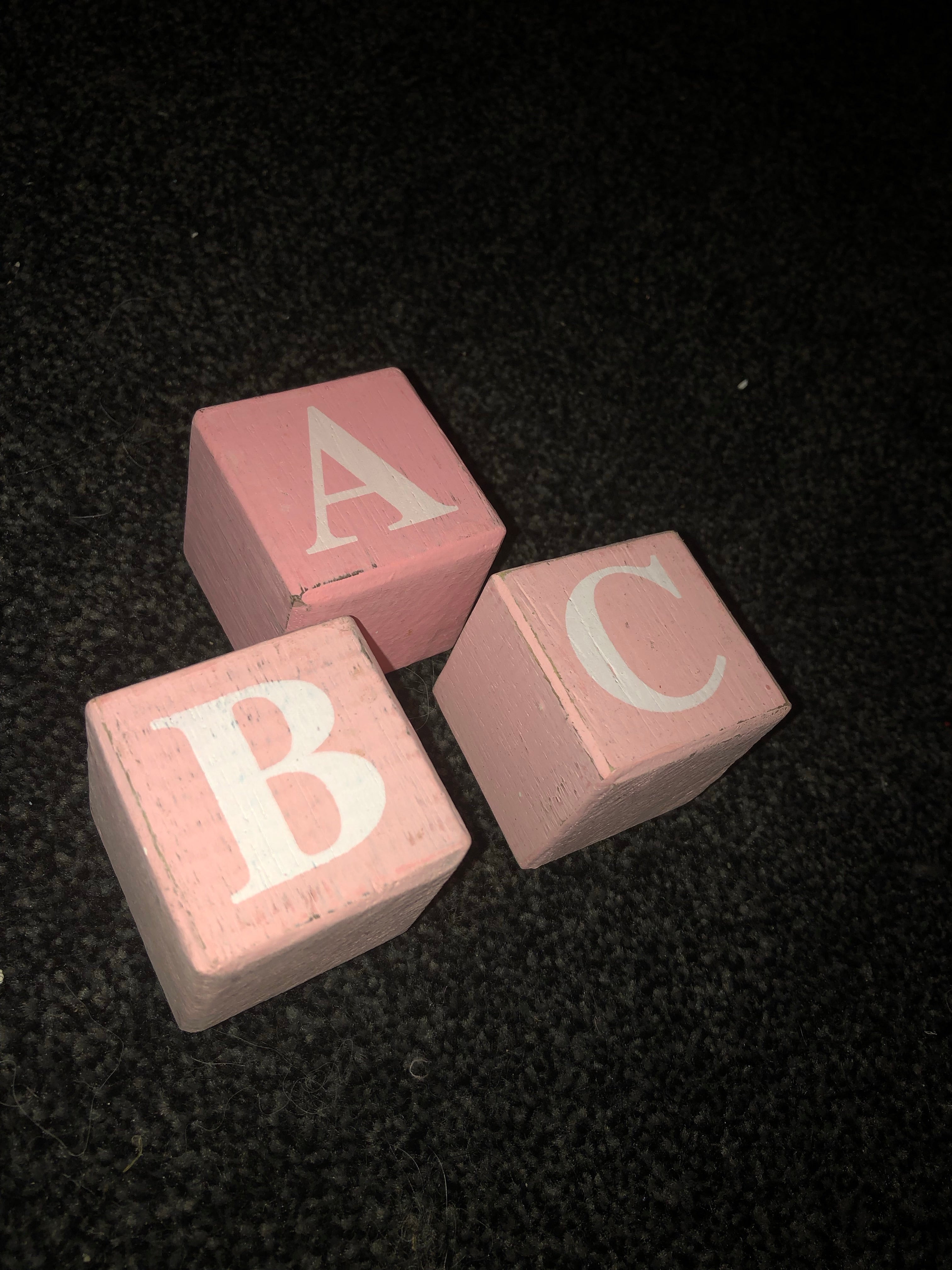 pink letter blocks