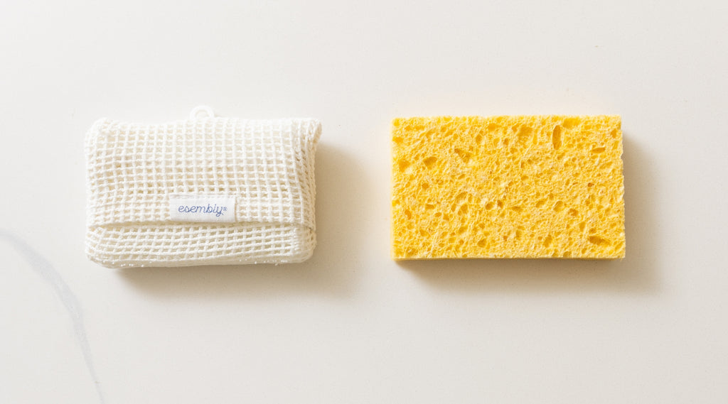 An Esembly GoTwo sponge on the left and a traditional yellow sponge on the right
