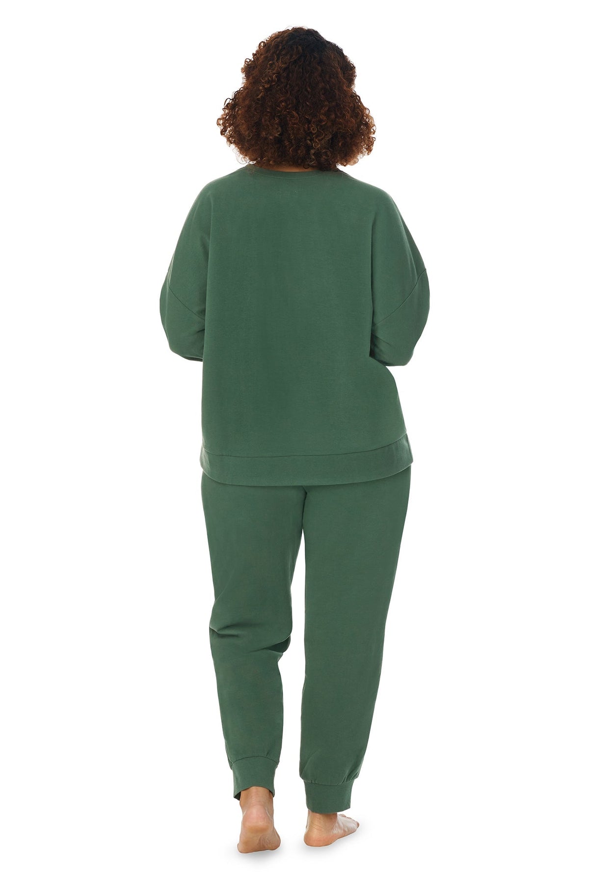 A lady wearing a green long sleeve crew embroidered plus size lounge set.