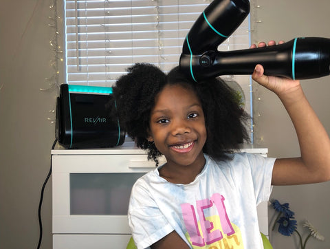 child with natural hair using the revair