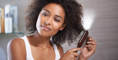 woman combing hair