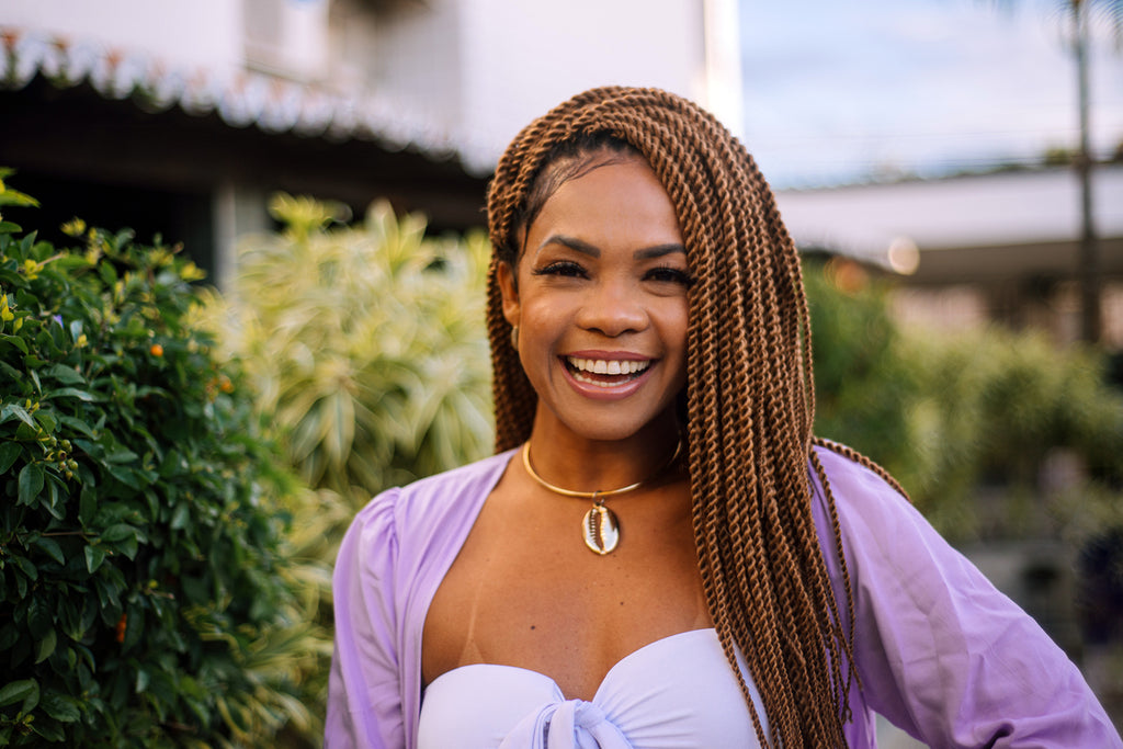 woman wearing twisted braids hair growth