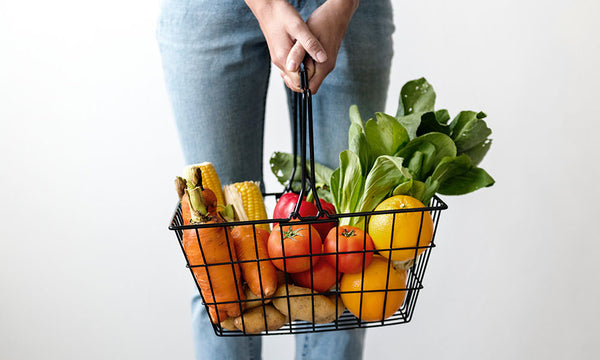 basket full of fresh fruits and vegetables